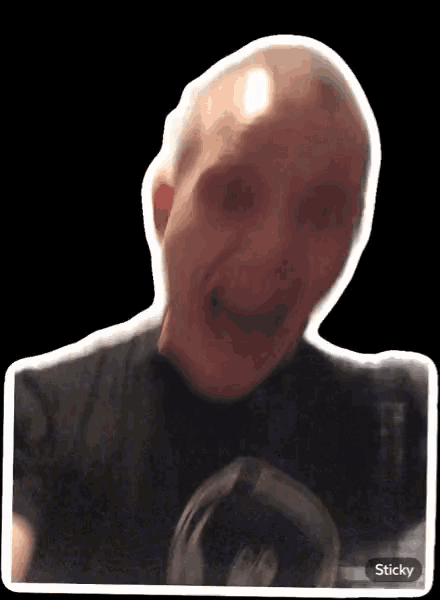 a sticker of a man 's face with the word sticky on the bottom