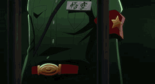 a man in a green uniform has a name tag on his chest that says ' goku '