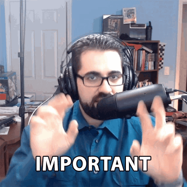 a man wearing headphones stands in front of a microphone with the word important above him