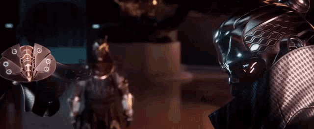 a man with a beard wearing a helmet looks at the camera