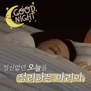 a woman is sleeping under a blanket with the words good night written above her