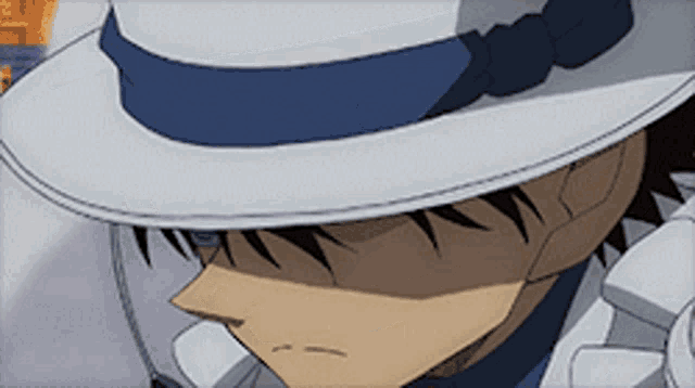 a close up of a person wearing a hat