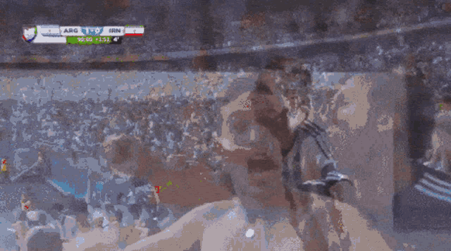 a soccer game between argentina and iran is being played in a stadium