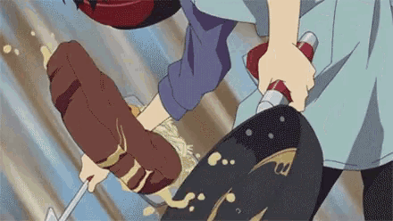 a person is holding a knife and cutting a piece of meat with a knife .