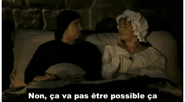 a man and a woman laying in bed with the words non ca va pas être possible ca written below them
