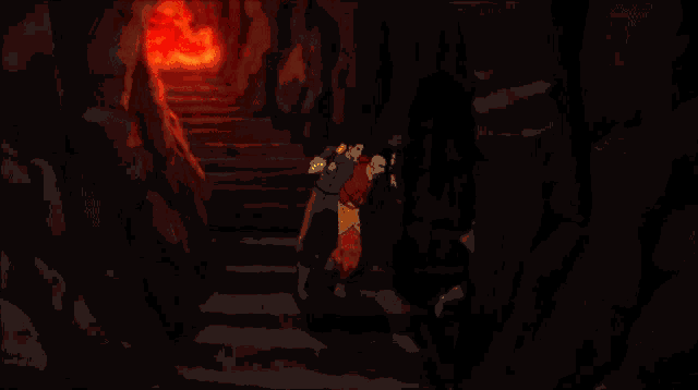 a large red fire is coming out of a dark cave .