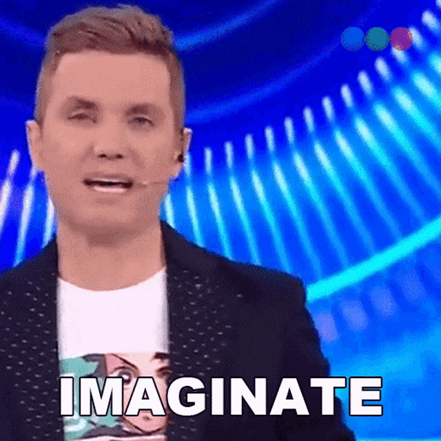 a man with a microphone in his ear is saying " imagine "