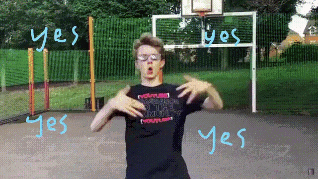 a boy wearing a black shirt that says ' yes ' on it