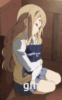 a girl is hugging a book and the word gm is on the bottom right