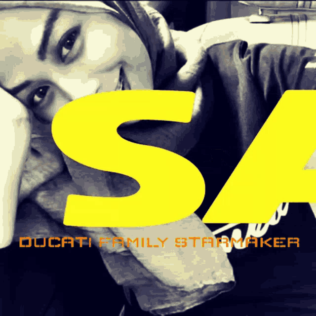 a woman in a hijab is smiling with the letter s behind her