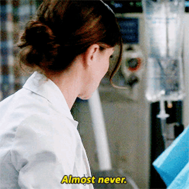 a woman in a lab coat is saying almost never