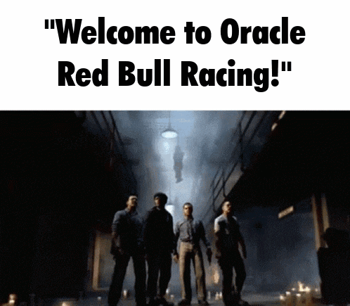 a sign that says " welcome to oracle red bull racing ! "