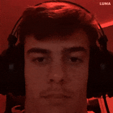 a man wearing headphones with the word luma on the bottom left