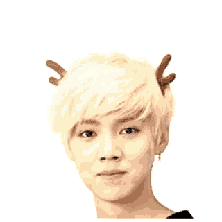 a young man with antlers on his head and a heart above his head