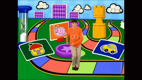 a man in an orange shirt is standing in front of a board game with a snail on it