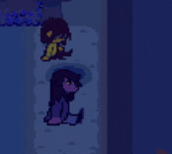 a pixel art of two people standing next to each other in a dark room in a video game .