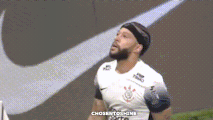 a man with a beard is wearing a headband and a nike logo in the background .