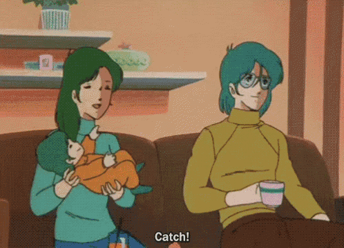 a cartoon of a woman holding a baby and a man sitting on a couch that says catch