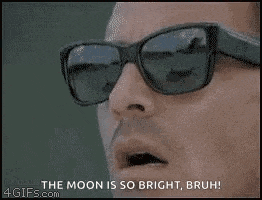a man wearing sunglasses says `` the moon is so bright bruh '' .