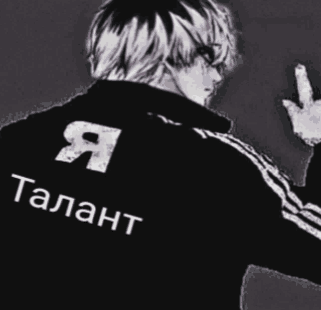 a man wearing a black jacket with the word talent on it