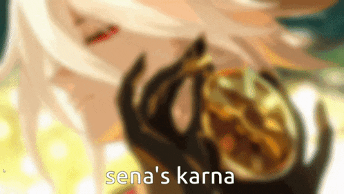 a blurred image of a person holding a gold object with the words sena 's karna written on it