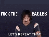 a man with a mustache is giving the middle finger and saying `` fuck the eagles let 's repeat that '' .
