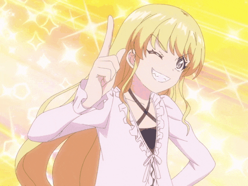 a girl with blonde hair is giving a thumbs up and smiling