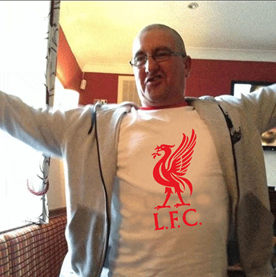 a man wearing a shirt that says l.f.c.