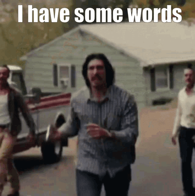 a man in a striped shirt is running with the words i have some words above him