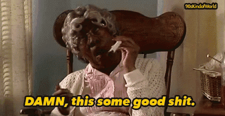 an elderly woman sitting in a rocking chair talking on a cell phone and saying damn this some good shit