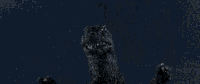 a statue of a dragon with a blue light coming out of its eyes