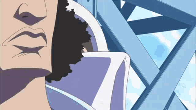 a close up of a person 's face with a purple hat on