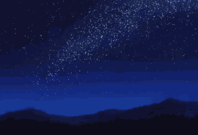 a night sky with a lot of stars and mountains in the background