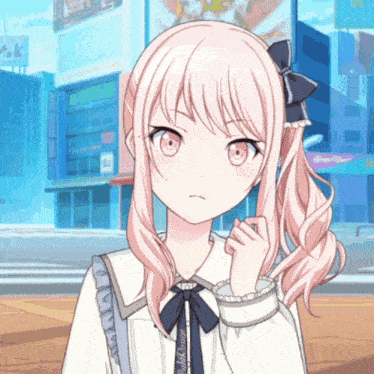 a girl with pink hair is wearing a white shirt with a blue bow and a ribbon that says pink orange