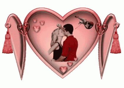 a picture of a man and a woman kissing in a heart shaped frame