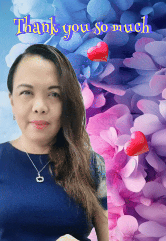 a woman is standing in front of purple flowers and the words thank you so much