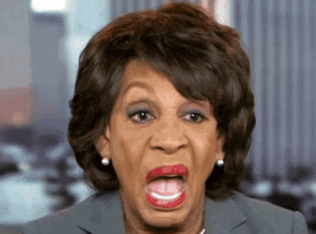 a woman making a funny face with her tongue hanging out