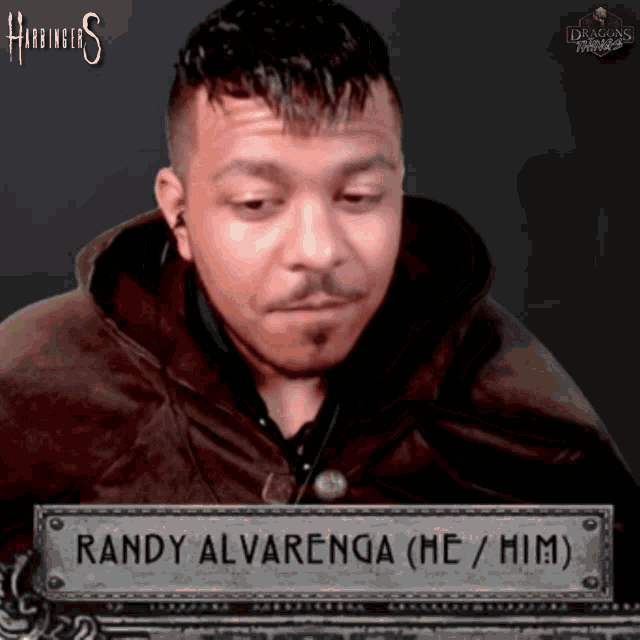 a picture of randy alvareza with a dragons logo