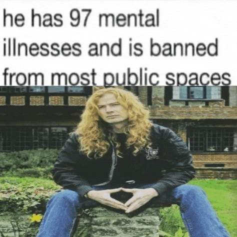 a man with long red hair is sitting on a rock in front of a building with a caption that says he has 97 mental