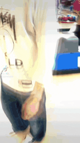 a blurred image of a person 's back with ld written on it
