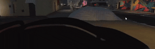 a car is driving down a street next to a brick wall in a video game .