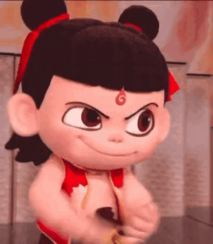 a stuffed toy of a cartoon character with a red bow on his head is smiling .