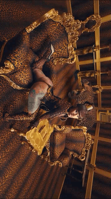 a close up of a woman 's face with a leopard print top