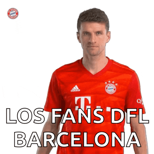 a man wearing a red adidas shirt says los fans dfl barcelona