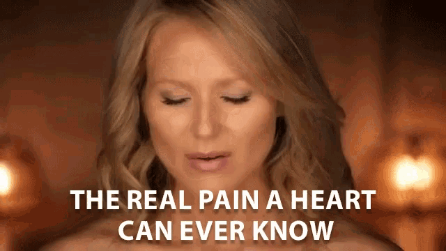 a woman with the words the real pain a heart can ever know behind her