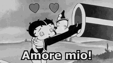 betty boop is kissing a clown in a black and white cartoon with the words amore mio .