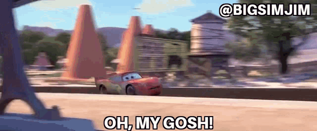 a car from the movie cars is driving down a track and says oh my gosh