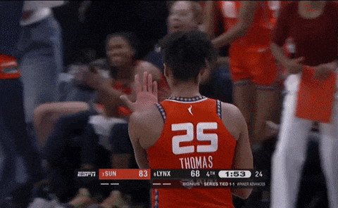 a basketball player wearing a red jersey with the number 25 on it
