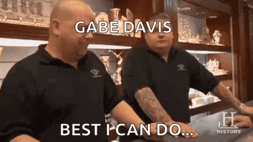 two men are standing next to each other in a store and one of them is saying gabe davis best i can do .