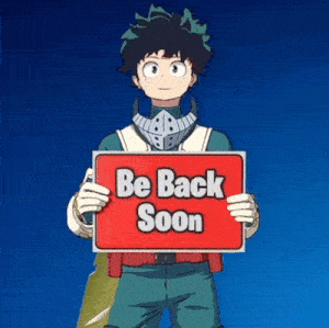a person holding a sign that says be back soon